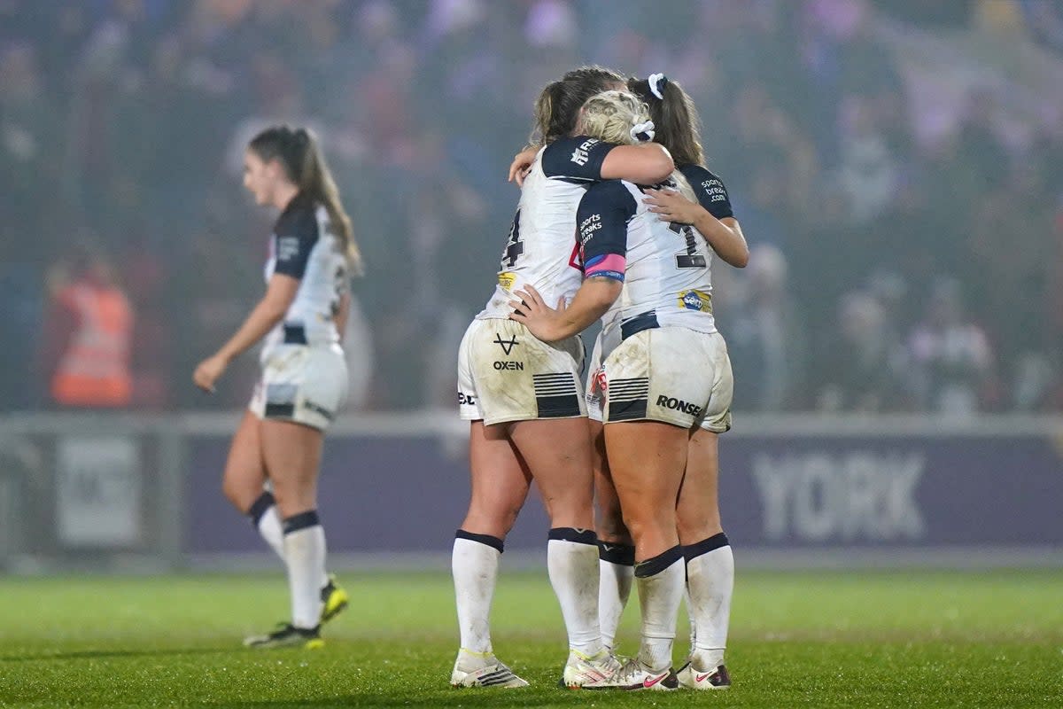 England players console each other after defeat to New Zealand (Tim Goode/PA). (PA Wire)