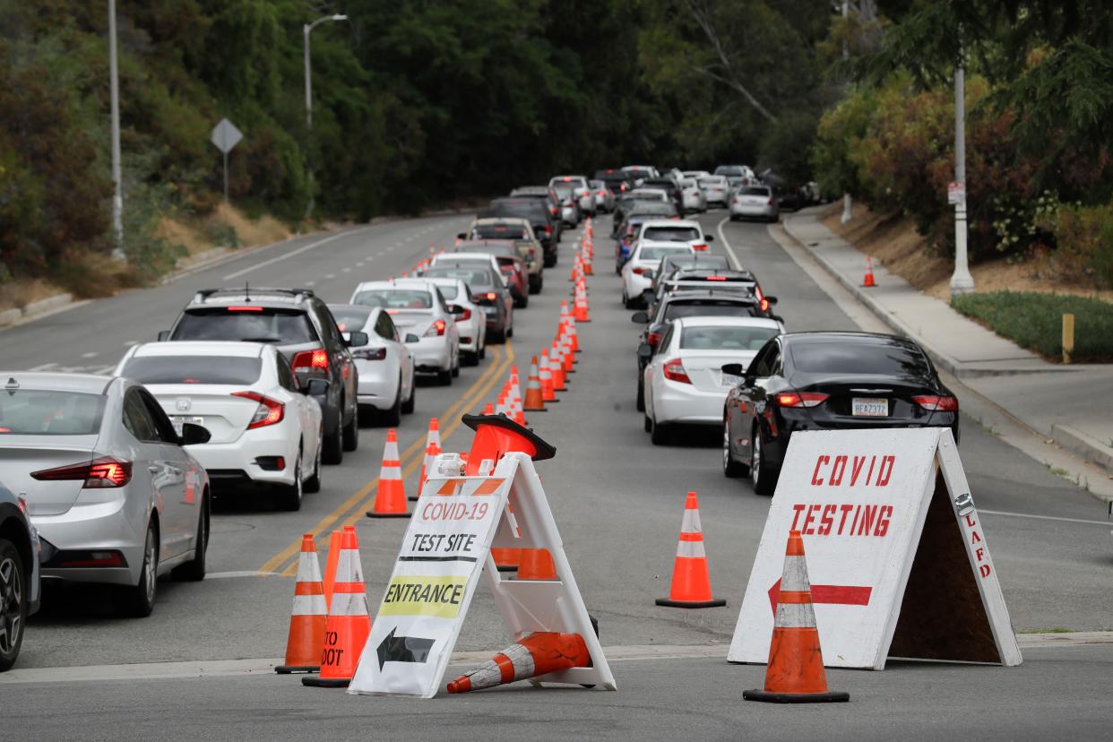 Motorists line up at a coronavirus testing site at Dodger Stadium on June 29, 2020 in Los Angeles.