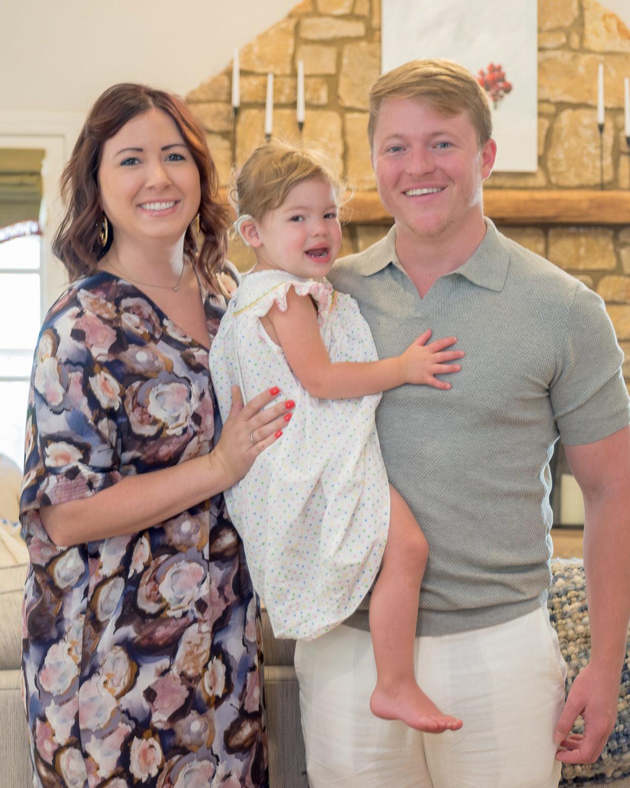 Lara, Vivienne and Adam Thornton love their home in High Point Terrace.