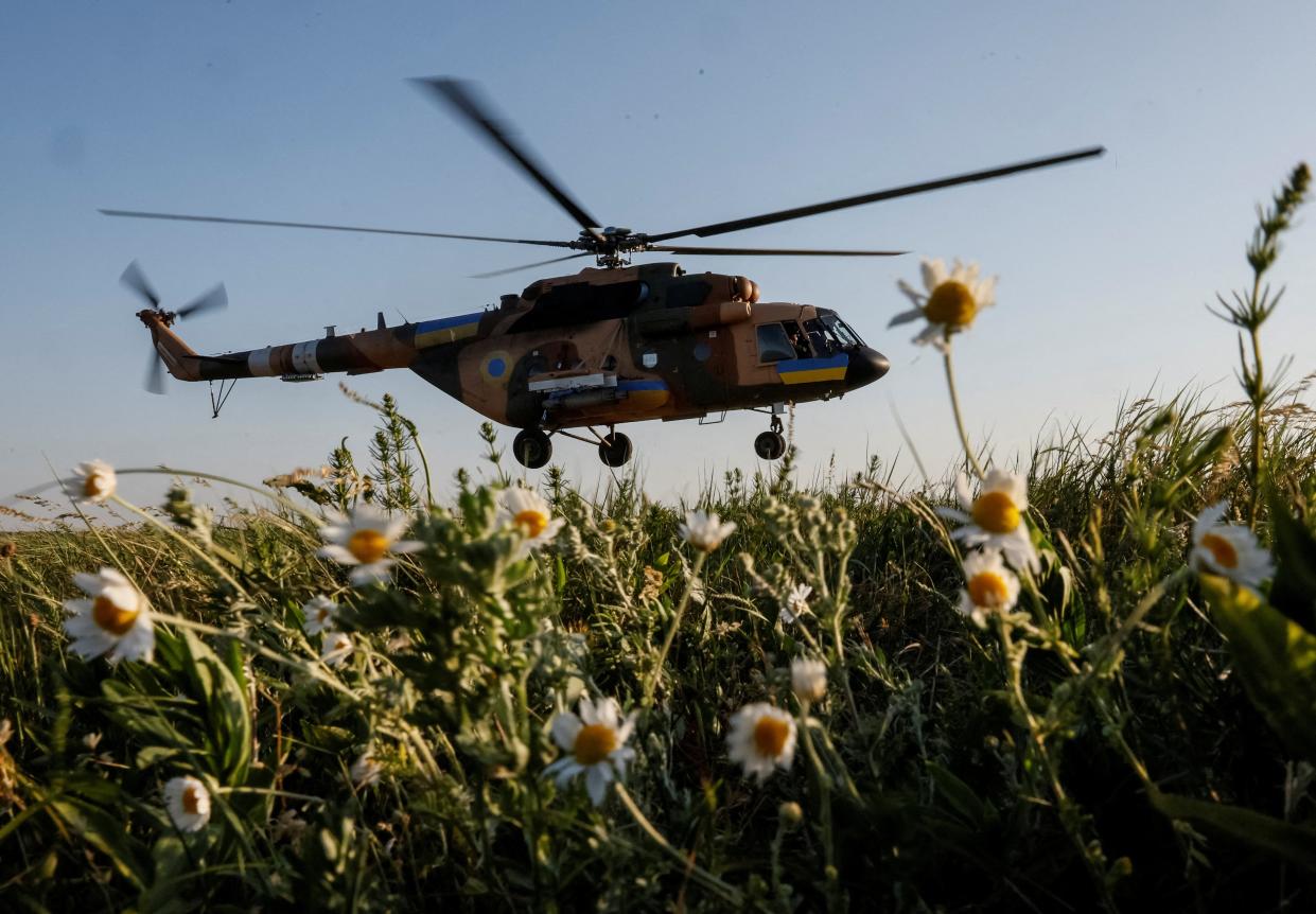 A Ukrainian military helicopter takes off to carry out a mission, amid Russia's attack on Ukraine, during military drills in the north of Ukraine, June 1, 2023 (REUTERS)