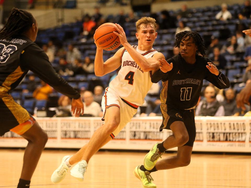 Rochester's Henry Buecker drives against Southeast during the Capital City Showcase at the Bank of Springfield Center on Saturday, Dec. 2, 2023.