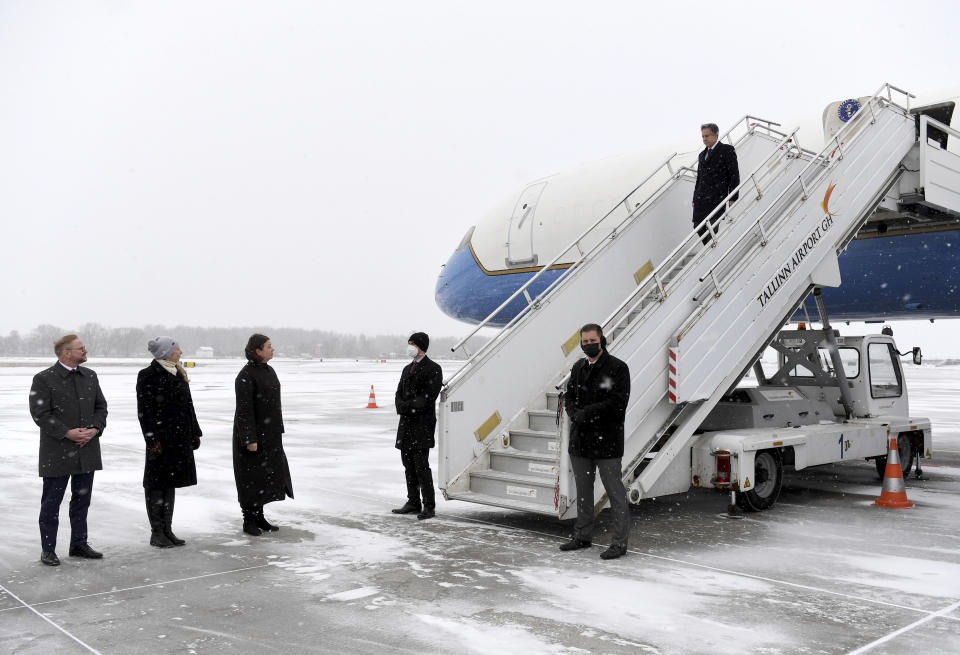 U.S. Secretary of State Antony Blinken, top right, disembarks from his plane upon arriving in Tallinn, Estonia, on Tuesday, March 8, 2022. Blinken visited Lithuania and Latvia on Monday to calm any fears that they and Estonia, which he is visiting Tuesday, have about their security. The three Baltic countries, which endured decades of Soviet occupation before regaining their independence in 1991, are members of the EU and NATO. (Olivier Douliery/Pool Photo via AP)