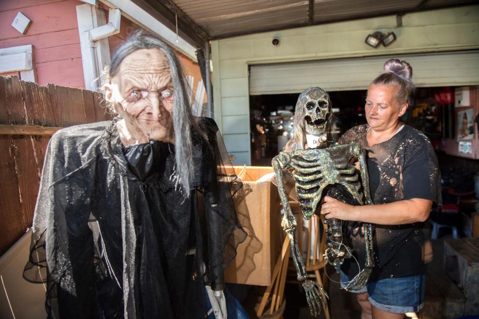 Jeanna Pack works on readying Halloween decorations at her home on Oto Avenue near Farm Street in east Stockton on Thursday, Sept. 22, 2022. Pack has been doing elaborate Halloween displays at her home for the past 26 years. 