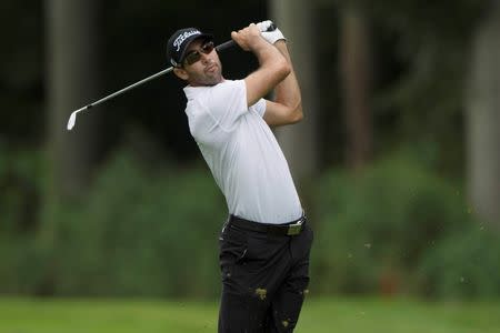 Aug 22, 2014; Paramus, NJ, USA; Cameron Tringale hits his approach shot on fourth hole during the second round of The Barclays golf tournament at Ridgewood Country Club. Tommy Gilligan-USA TODAY Sports