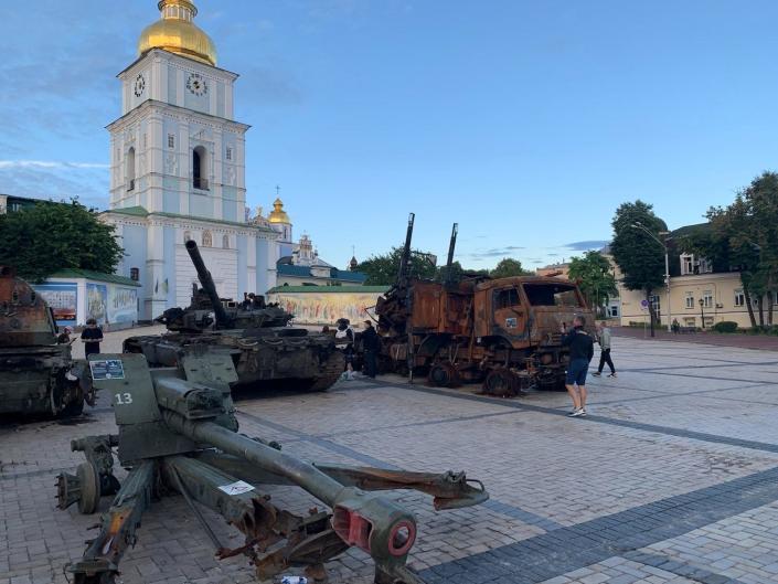 The courtyard in front of St. Michael&#39;s Golden-Domed Monastery displays destroyed Russian armor. 