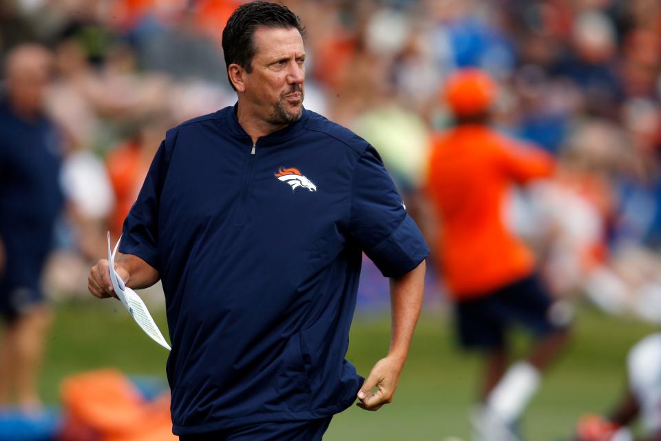 FILE - In this Aug. 4, 2016, file photo, Denver Broncos quarterbacks coach Greg Knapp watches during NFL football training camp in Englewood, Colo. Knapp, an assistant coach with the New York Jets, died Thursday, July 22, 2021, of injuries suffered in a bicycle accident near his home in California last Saturday. He was 58. Knapp's family released a statement through the team that the longtime NFL assistant coach had died. (AP Photo/David Zalubowski, File)