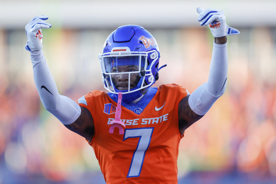 Boise State cornerback A'Marion McCoy (7) calls for the Boise State crowd to get louder after Utah State turn the ball over on downs late in the first half of an NCAA college football game, Saturday, Oct. 5, 2024, in Boise, Idaho. . (AP Photo/Steve Conner)