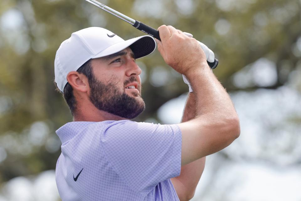 Scottie Scheffler, hitting his tee shot at the seventh hole of the Bay Hill Club and Lodge in Orlando on Sunday, dominated the final round of the Arnold Palmer Invitational and will try to defend at The Players Championship beginning on March 14 at the Players Stadium Course at TPC Sawgrass.