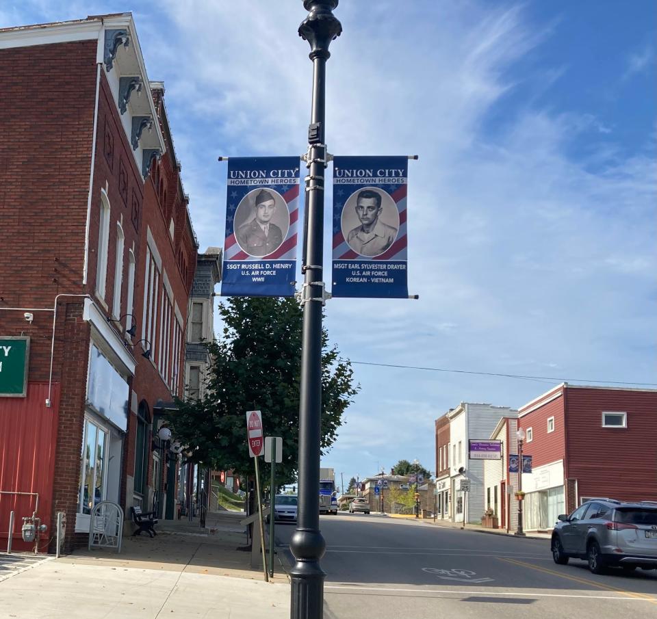 Union City Hometown Heroes banners are shown alongside South Main Street.