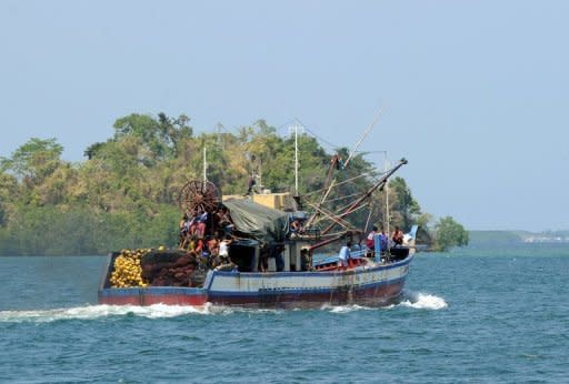 A Filipino-owned fishing boat sets off for a fishing expedition near the Scarborough Shoal from the coastal town of Masinloc, near Manila, on May 10. Philippine President Benigno Aquino convinced protesters to abort plans to sail Friday to a disputed South China Sea shoal as he sought ways to resolve a tense stand-off with China