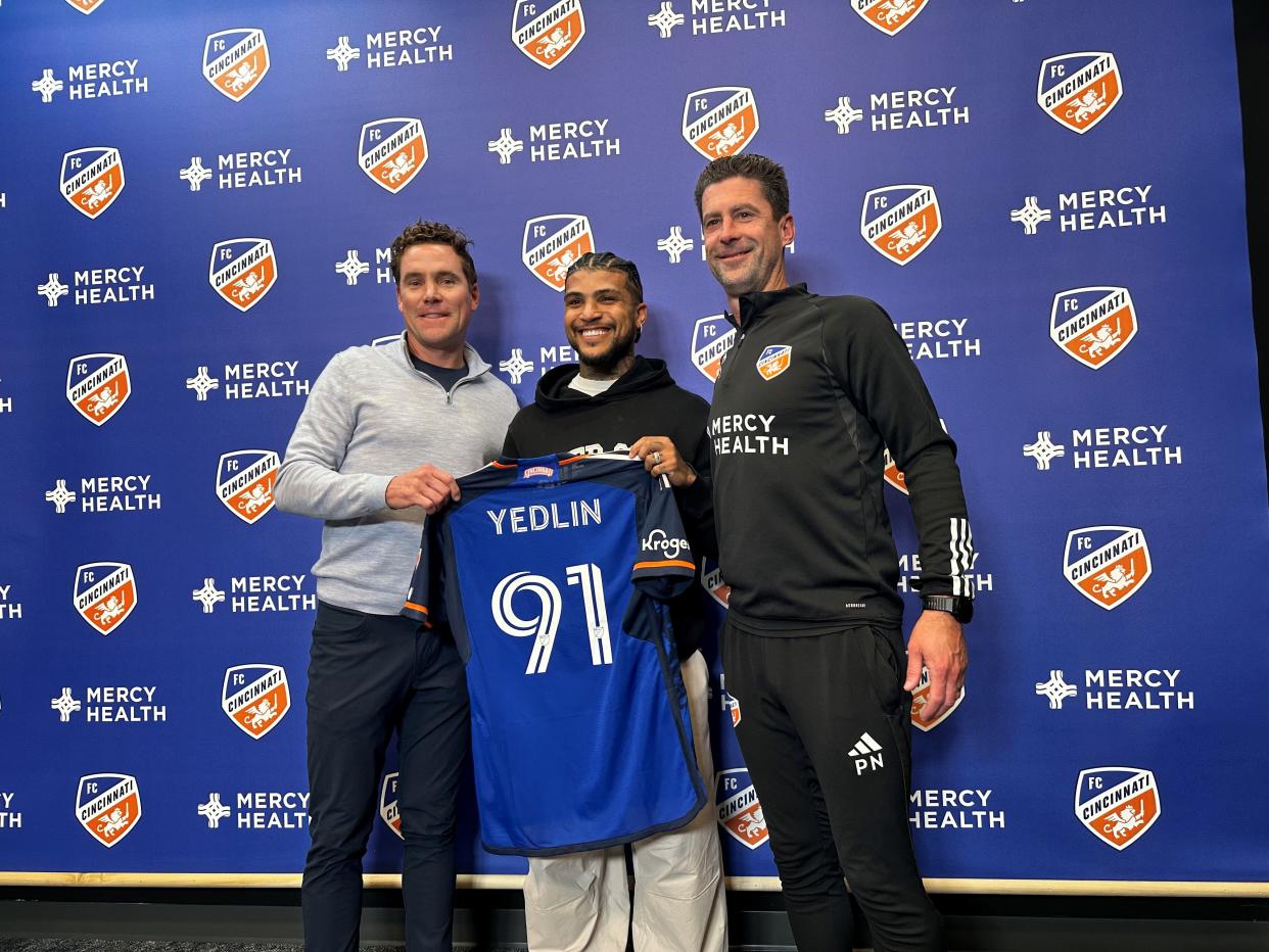 Newly-acquired defender DeAndre Yedlin (91) is introduced as an FC Cincinnati player during a March 5, 2024 news conference at the Mercy Health Training Center in Milford.