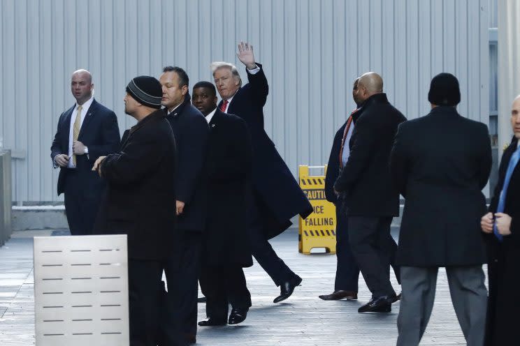 Trump exits One World Trade Center following a meeting in New York City on Friday. (Lucas Jackson/Reuters)