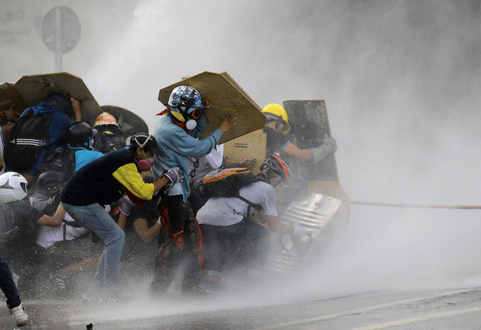 Water cannons blast Venezuelan protesters