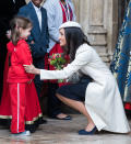 <p>Prince Harry’s bethrothed made a little girl’s day on Monday, when she accepted a bouquet of flowers from her at the 2018 Commonwealth Day service at Westminster Abbey in London. (Photo: Samir Hussein/Samir Hussein/WireImage) </p>