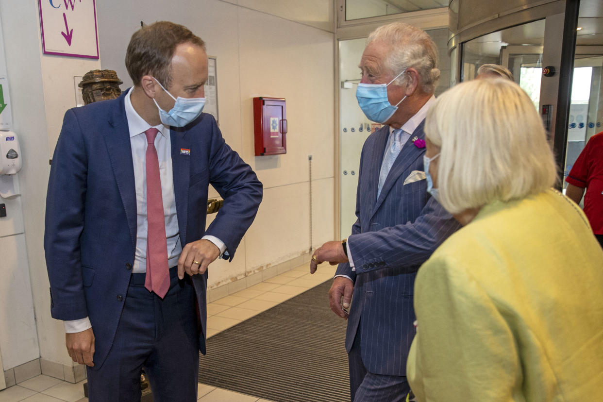 Britain's Health Secretary Matt Hancock (L) speaks with Britain's Prince Charles, Prince of Wales (2nd R), during a visit to Chelsea & Westminster Hospital in London on June 17, 2021. (Photo by Steve REIGATE / POOL / AFP) (Photo by STEVE REIGATE/POOL/AFP via Getty Images)