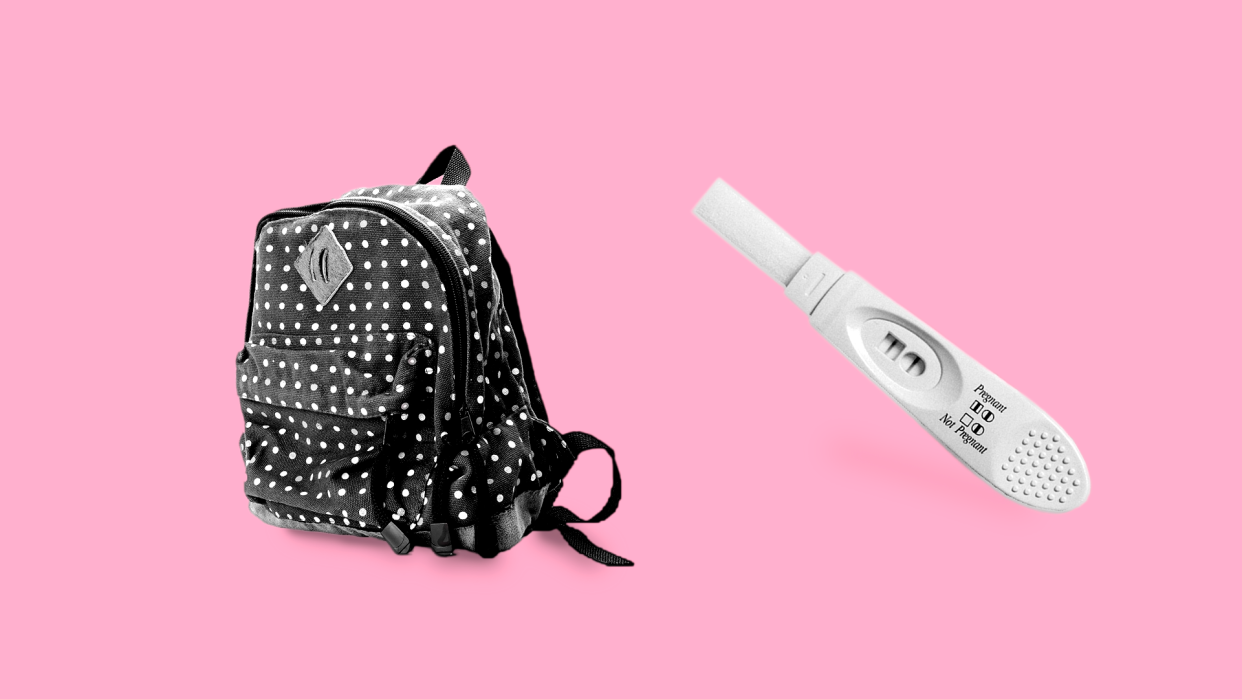 Image of backpack next to pregnancy test stick against pink background.