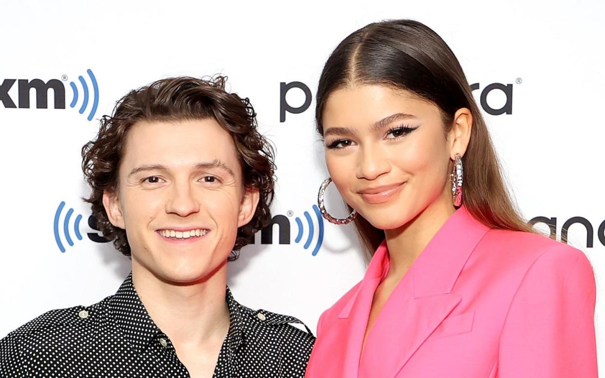 Tom Holland and Zendaya attend SiriusXM's Town Hall with the cast of Spider-Man: No Way Home on December 10, 2021 in New York City.