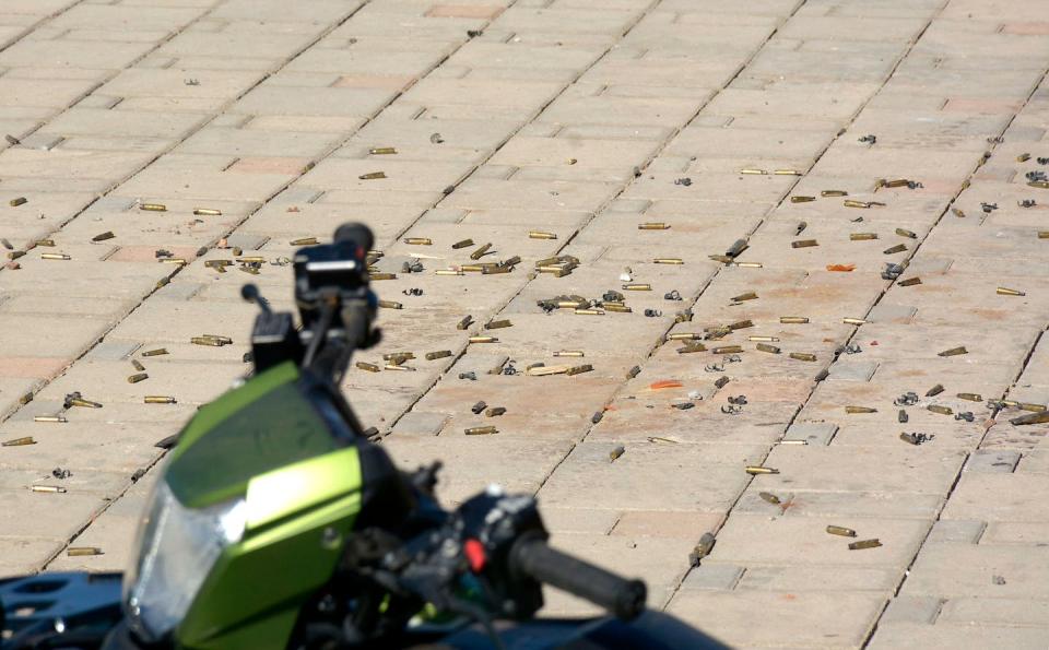 Bullet casings outside the Mexican home of drug trafficker Ovidio Guzmán-López, whom police arrested in January 2023. <a href="https://media.gettyimages.com/id/1246073900/photo/mexico-drugs-violence-guzman-arrest.jpg?s=1024x1024&w=gi&k=20&c=BCo4jL_w0j13ebbvBvACoLgyhF6E-daIAVuQbcRDdBA=" rel="nofollow noopener" target="_blank" data-ylk="slk:Juan Carlos Cruz/AFP via Getty Images;elm:context_link;itc:0;sec:content-canvas" class="link ">Juan Carlos Cruz/AFP via Getty Images</a>