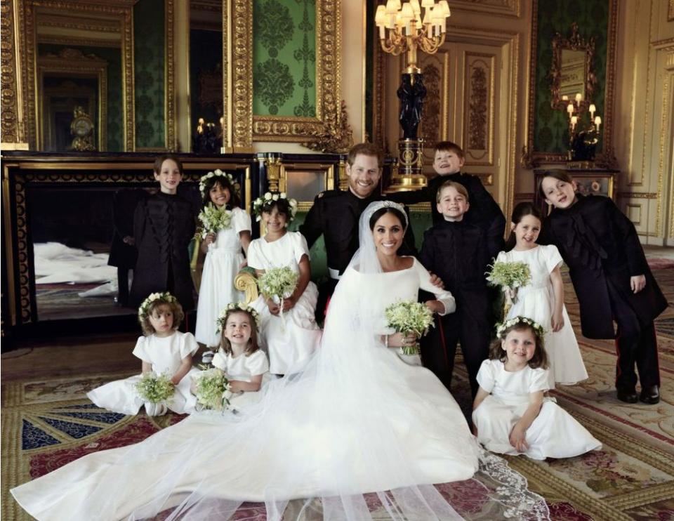 Prince Harry and Meghan Markle with (left-to-right): Back row: Master Brian Mulroney, Miss Remi Litt, Miss Rylan Litt, Master Jasper Dyer, His Royal Highness Prince George, Miss Ivy Mulroney, Master John Mulroney. Front row: Miss Zalie Warren, Her Royal Highness Princess Charlotte, Miss Florence van Cutsem