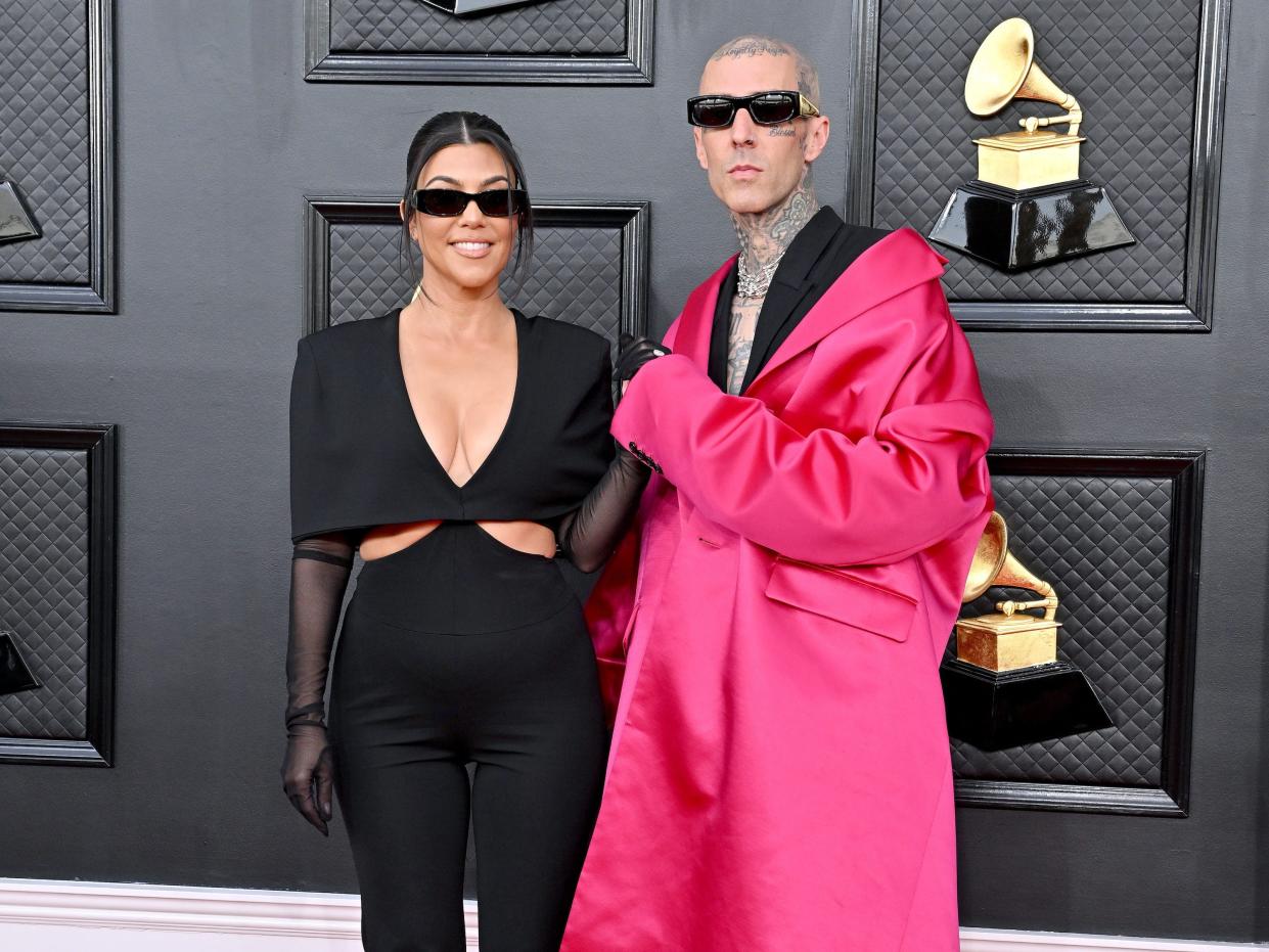 Kourtney Kardashian and Travis Barker at the 2022 Grammy Awards.