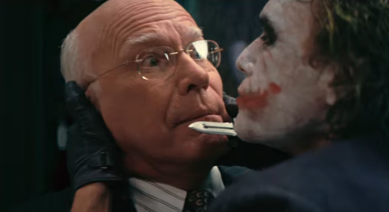 Leahy and Ledger in The Dark Knight (Credit: Warner Bros)