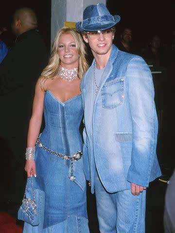 <p>Jeffrey Mayer/WireImage</p> Britney Spears and Justin Timberlake wear denim to the 2001 American Music Awards.