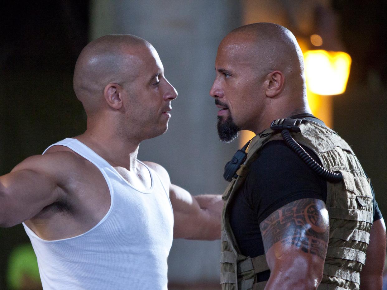 Facing off: Vin Diesel and Dwayne ‘The Rock’ Johnson square up in ‘Fast Five’ (2011 Universal Studios)