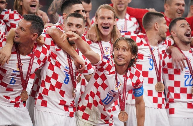 Croatia's Luka Modric (centre) celebrates with his team-mates after beating Morocco to finish third