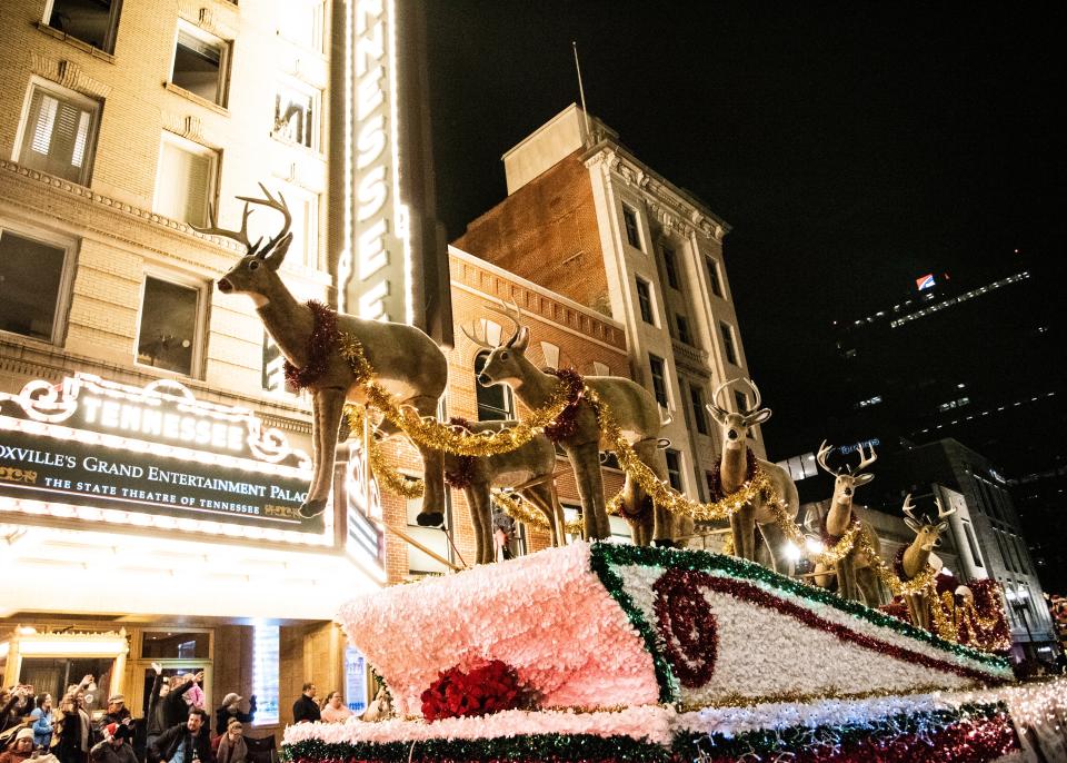 Santa's reindeer fly over Gay Street during the WIVK Christmas Parade on Saturday, December 7, 2019 in Downtown Knoxville.