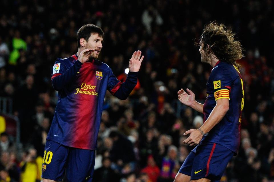Lionel Messi and Carles Puyol played together for ten years at Barcelona (Getty Images)