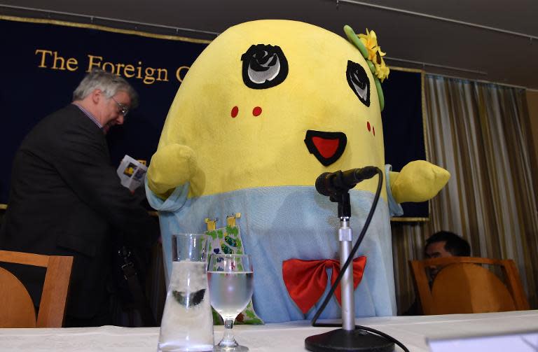 Pear fairy "Funassyi", the unofficial mascot of Funabashi City, appears at the Foreign Correspondents' Club in Tokyo on March 5, 2015