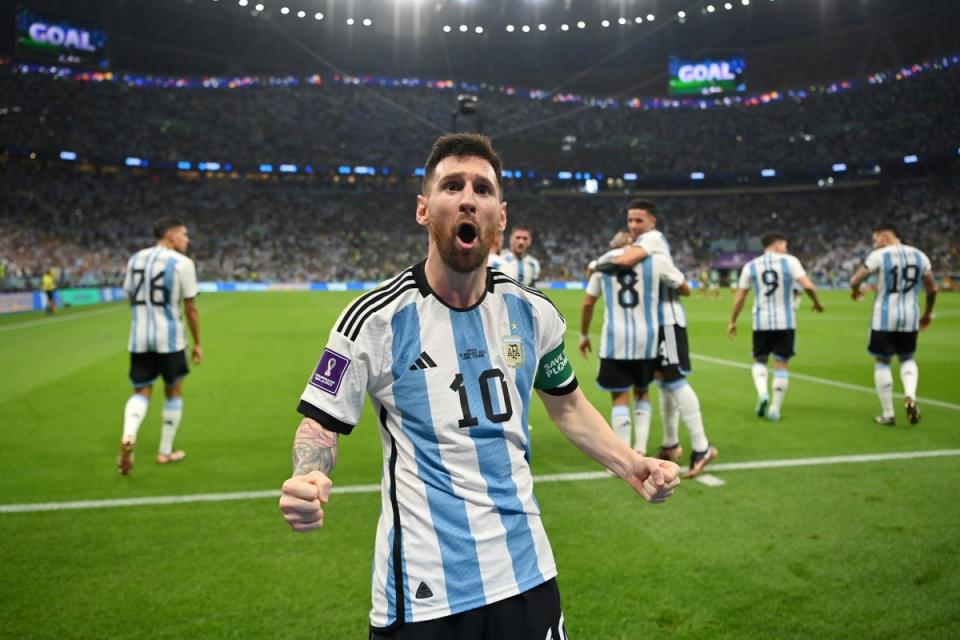 Lionel Messi celebrates after scoring Argentina’s first goal (Getty Images)