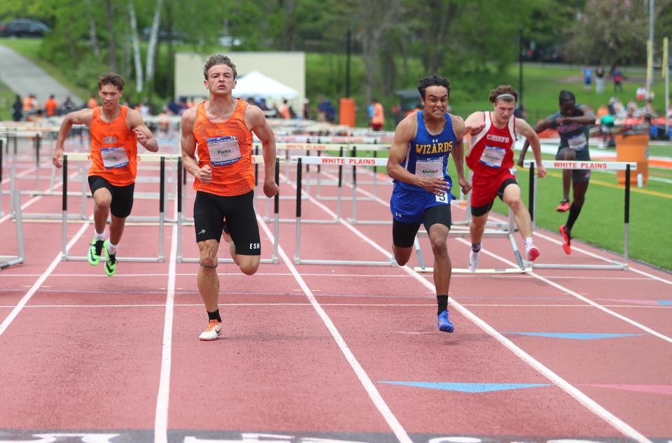 Washingtonville's Elijah Mallard runs the 110-meter hurdles during Day 3 of the Loucks Games track and field meet at White Plains High School on Saturday, May 14, 2022.