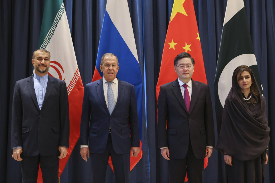 In this handout photo released by Russian Foreign Ministry Press Service, from left: Iranian Foreign Minister Hossein Amir-Abdollahian, Russian Foreign Minister Sergey Lavrov, Chinese Foreign Minister Qin Gang and Pakistani Minister of State for Foreign Affairs Hina Rabbani Khar pose for a group photo during a ministerial meeting in Samarkand, Uzbekistan, Thursday, April 13, 2023. (Russian Foreign Ministry Press Service via AP)