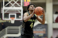 FILE - In this Jan. 19, 2020, file photo, Prolific Prep's Jalen Green (4) shoots a free throw against La Lumiere during a high school basketball game at the Hoophall Classic in Springfield, Mass. Green bypassed college basketball to play in the G League and is a top shooting guard in the NBA draft. (AP Photo/Gregory Payan, File)