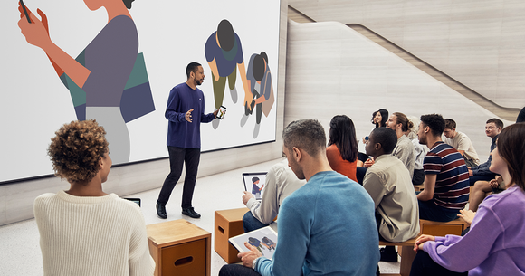 Apple classes taking place in an Apple Store classroom.