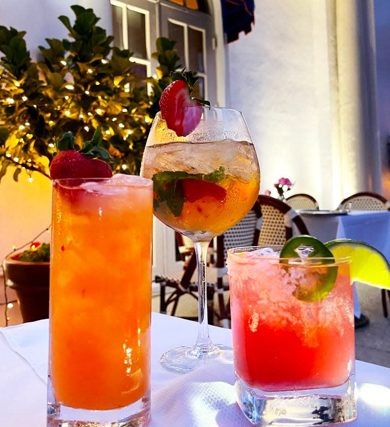 Cafe L'Europe's new cocktails include the vodka-spiked Peach Strawberry Lemonade, from left, Rose Sangria, and Spicy Hibiscus Margarita.