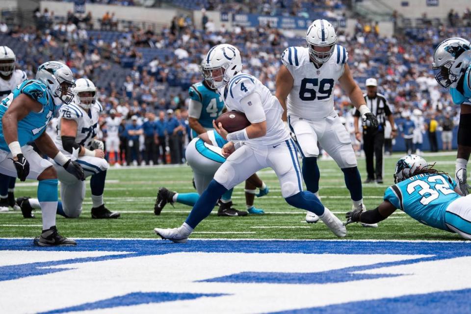 Indianapolis Colts quarterback Sam Ehlinger (4) runs up the middle for a two-point conversion against the Carolina Panthers Sunday. The Colts scored 11 points in the fourth quarter to win, 21-18.