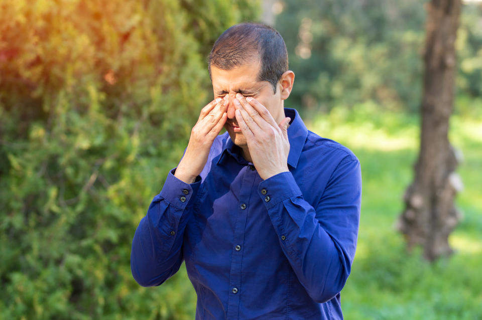 Man with itchy eyes from hay fever. (Getty Images)