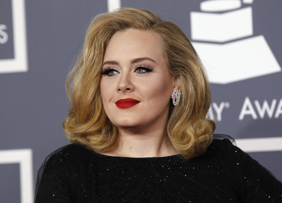 British singer Adele arrives at the 54th annual Grammy Awards in Los Angeles, California February 12, 2012.   REUTERS/Danny Moloshok (UNITED STATES  - Tags: ENTERTAINMENT)  (GRAMMYS-ARRIVALS)