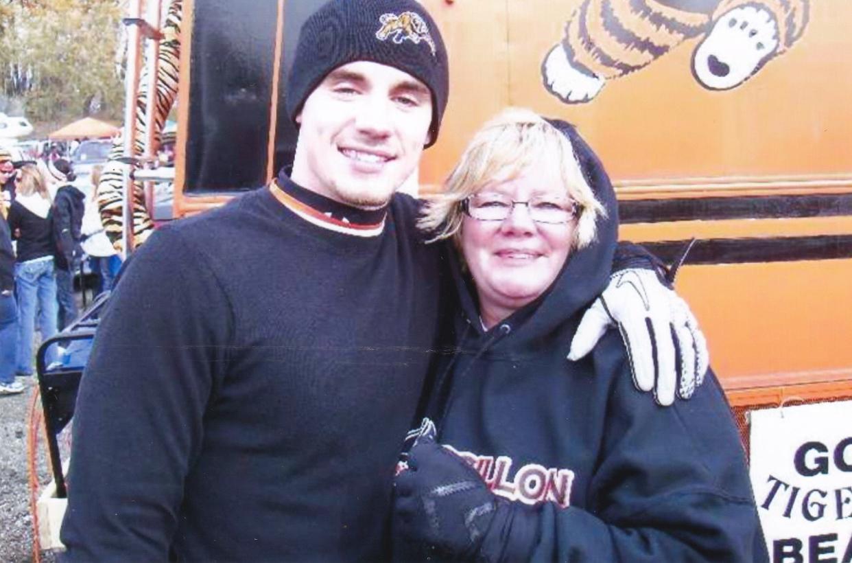 Troy Ellis and his mom, Cheryl Carter, tailgating at a Massillon football game