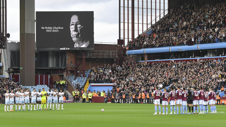 West Ham United and Aston Villa players participate in a minutes applause in memory of Bobby Charlton prior to their English Premier League match.