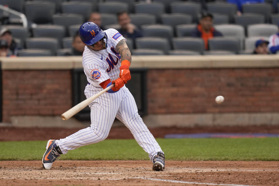 New York Mets' Francisco Alvarez hits a two-run double during the sixth inning of the second baseball game of a doubleheader against the Atlanta Braves at Citi Field, Monday, May 1, 2023, in New York. (AP Photo/Seth Wenig)