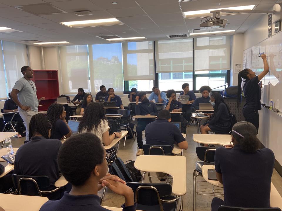 10th grade students in their seminar class lead each other through an exercise. (Brooklyn Laboratory Charter Schools)