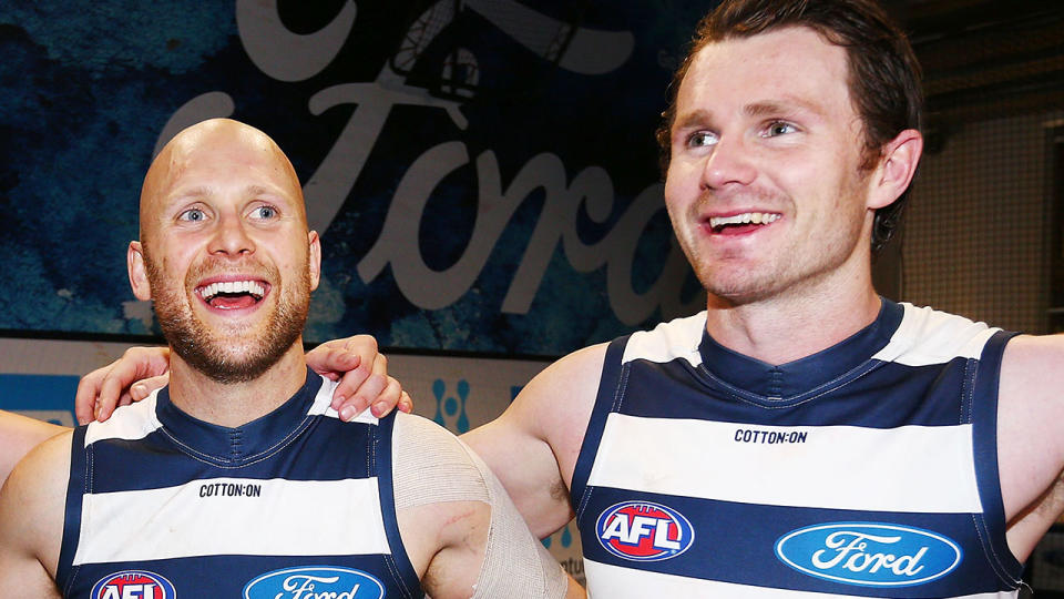 Pictured here, Geelong stars Gary Ablett and Patrick Dangerfield embrace after a match.