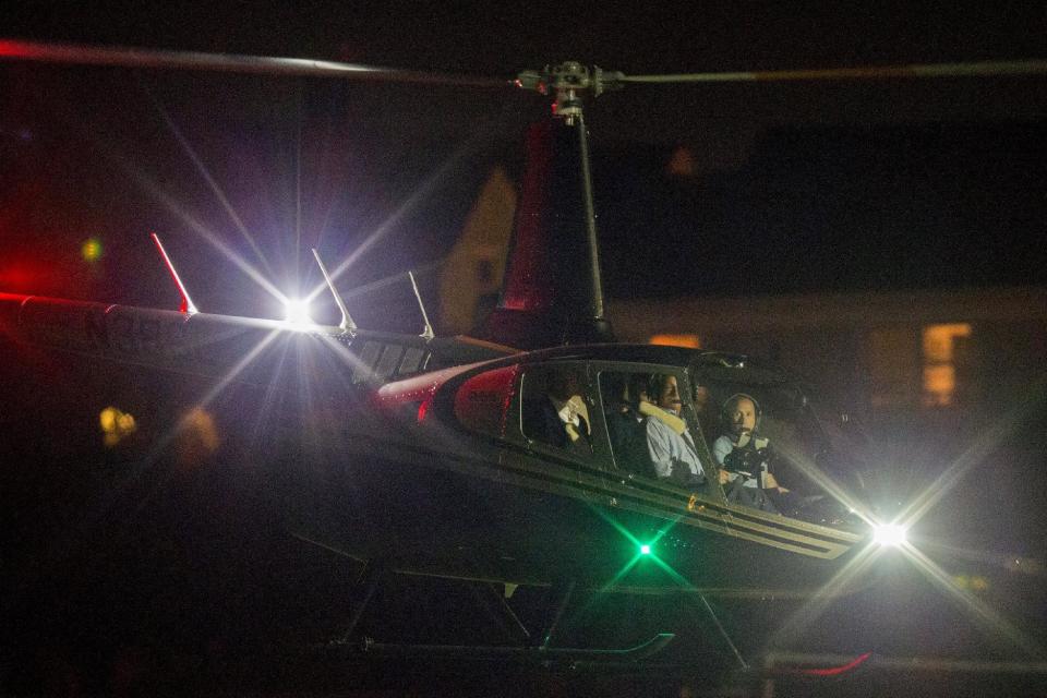 New England Patriots quarterback Tom Brady sits in the back seat of a helicopter as he departs after speaking at Salem State University in Salem, Massachusetts, United States May 7, 2015. REUTERS/Brian Snyder