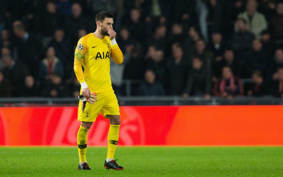 Hugo Lloris leaves the pitch following his red card against PSV  - Getty Images Europe