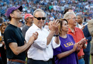 <p>Speaker Paul Ryan of Wis., left, Senate Minority Leader Chuck Schumer of N.Y., House Minority Leader Nancy Pelosi of Calif., and Senate Majority Leader Mitch McConnell of Ky., applaud a message by President Donald Trump on the video board, before the Congressional baseball game, Thursday, June 15, 2017, in Washington. (Photo: Alex Brandon/AP) </p>