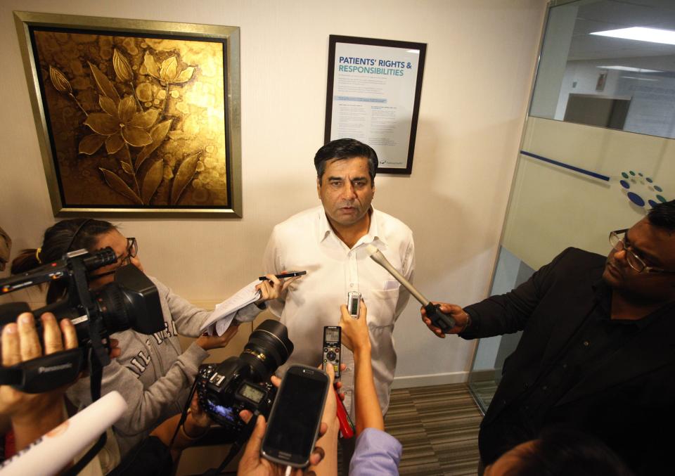 Indian High Commissioner to Singapore T.C.A. Raghavan addresses the media at Mount Elizabeth Hospital. (Reuters photo)