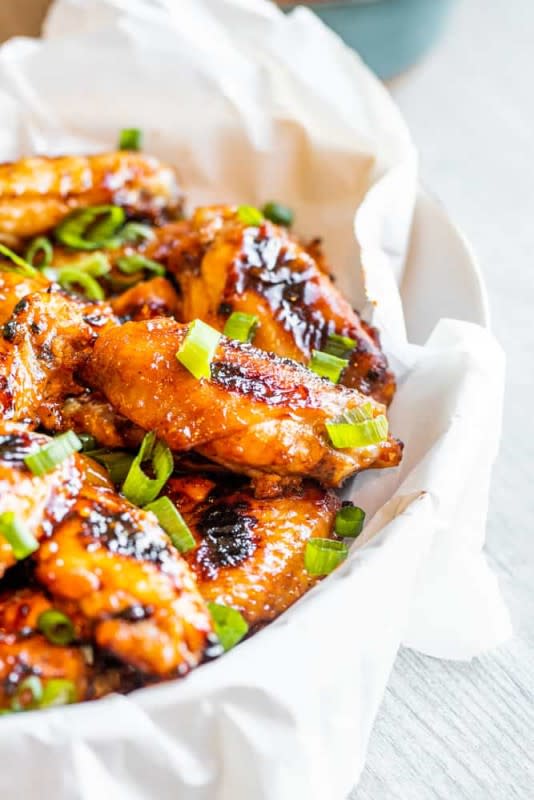 <p>Erhardts Eat</p><p>Summer is almost here, which mean grilling season is almost here! This Peach Grilled Chicken Wings recipe is sweet, a bit spicy and smokey for a delicious flavor combination.</p><p><strong>Get the Recipe: </strong><a href="https://erhardtseat.com/grilled-chicken-wings-recipe/" rel="nofollow noopener" target="_blank" data-ylk="slk:Grilled Peach Chicken Wings;elm:context_link;itc:0;sec:content-canvas" class="link ">Grilled Peach Chicken Wings</a></p>